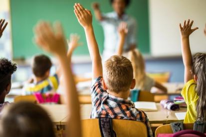 Kids raising hands