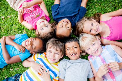 Children lying on grass