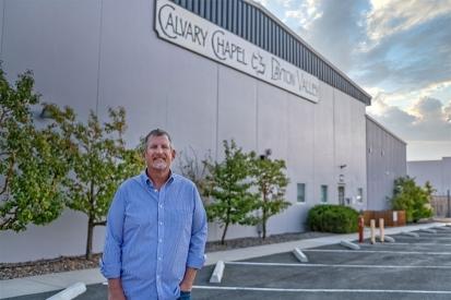 Calvary Chapel Dayton Valley pastor Garry Leist standing outside the church building