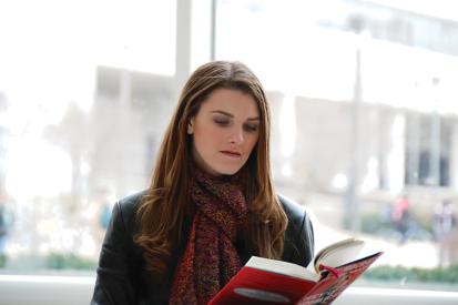 Emily Brooker is seen reading a book