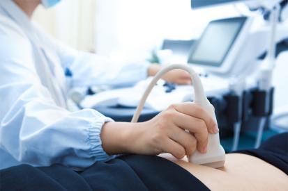 A woman is seen getting an ultrasound