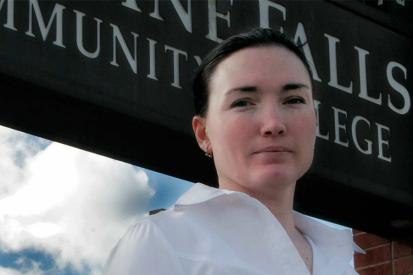 Beth Sheeran in front of Spokane Falls Community College sign