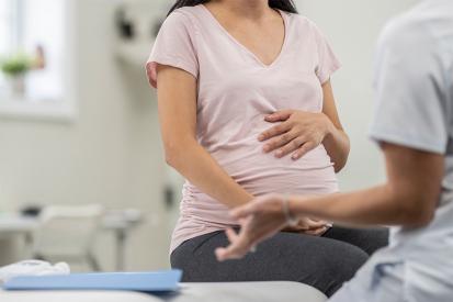 A pregnant woman is seen at an appointment