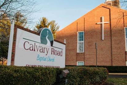 Calvary Road Baptist Church sign and building with cross