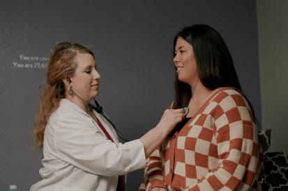 Nurse practitioner Chelsea Mynyk of Castle Rock Women's Health meets with a patient