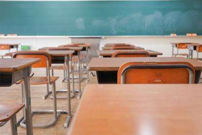 Empty Classroom with wooden desks