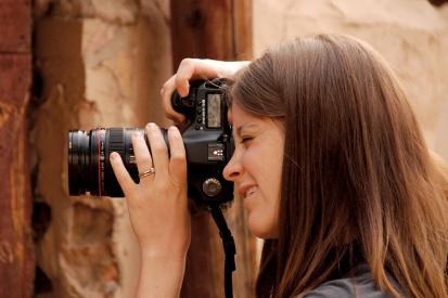 Elaine Huguenin is seen taking photos