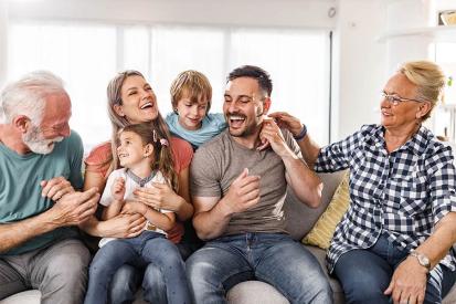 A group of family members laughing together