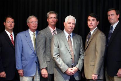 Grote family, owners of Grote Industries (L to R): William Dominic Grote, IV, president and COO (board director); Walter F. Grote, Jr., retired chairman (board director); W. Frederick Grote, III, director of applications engineering (secretary of board of directors); William D. Grote, III, chairman and CEO (board director); John R. Grote, VP of sales and marketing (asst. secretary of board of directors); Michael R. Grote, molding division supervisor (asst. treasurer of board of directors)