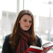 Emily Brooker reading a book