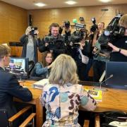 Paivi Rasanen is seen at her trial surrounded by media