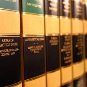 Law books are seen on a shelf