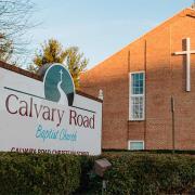 Calvary Road Baptist Church sign and building with cross