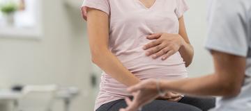 A pregnant woman is seen at an appointment