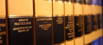 Law books are seen on a shelf