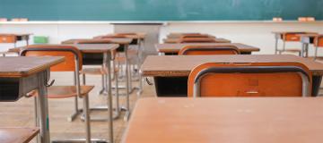 Empty Classroom with wooden desks