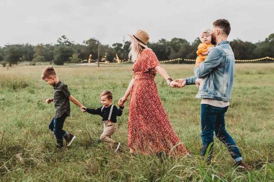 Family Walking in Field