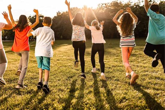 Children playing in a field