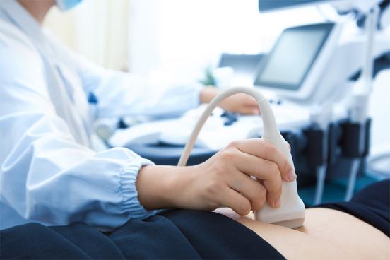 A woman is seen getting an ultrasound