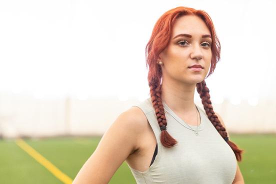 Selina Soule at an indoor track field