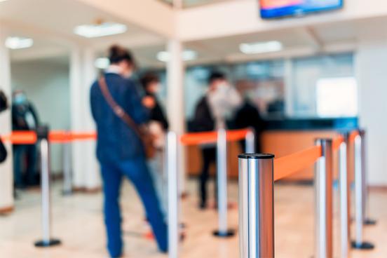 Indoor lines waiting for a teller at a bank