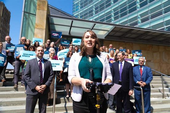 Options Care Center Executive Director Jessie Andersen speaking at a press conference