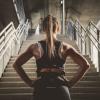 Female athlete staring at stairs