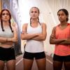 Selina Soule, Chelsea Michell, and Alanna Smith standing on the track serious