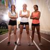 Selina Soule, Chelsea Michell, and Alanna Smith standing on the track smiling