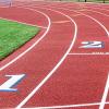 An all-weather running track is seen on a sunny day