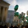 Signs and balloons reading 'create freely' are seen outside of the U.S. Supreme Court in Washington, D.C.