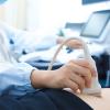 A woman is seen getting an ultrasound