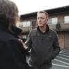 Mike Johnson of Yakima Union Gospel Mission talks with someone in a parking lot