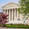 The U.S. Supreme Court is seen with trees in the foreground