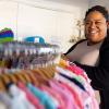 Pregnancy center director Jean Marie Davis stands among racks of clothing at Branches Pregnancy Center