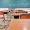 Empty Classroom with wooden desks