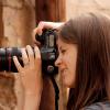 Elaine Huguenin is seen taking photos