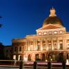 The Massachusetts State House is seen in Boston at night